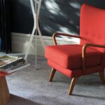 Axminster Carpets Hazy Days Leapfrog Swandown with red chair