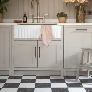 A Country Cream Kitchen with Harvey Maria Checked Flooring in Kiln Luna Black and Selene White Marble Tiles withs Veining
