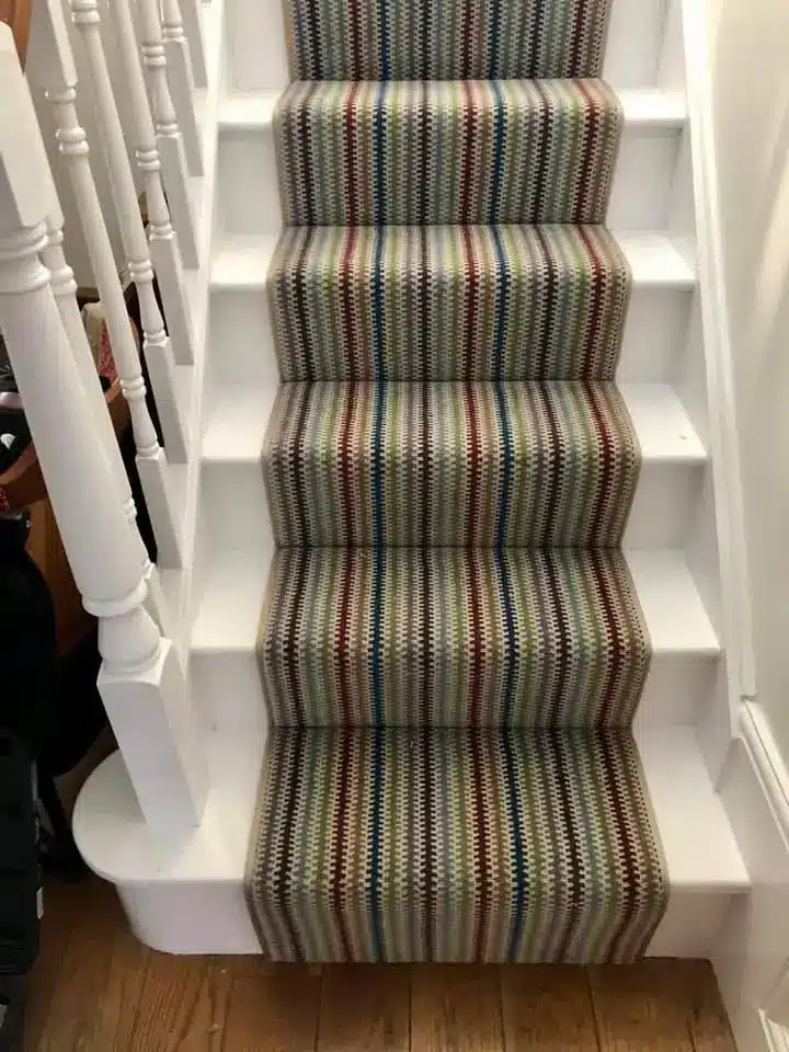 Alternative Carpets Stair Runner in QuirkyB Multicoloured Stripes with Matching Beige Taupe Carpet Whipping Runner on a White Wood Staircase Made and Fitted by Floormaster Yorkshire