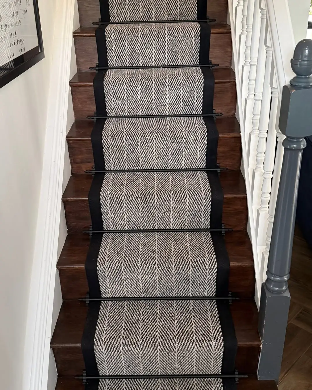 Carpet Runner in Monochrome Tweed with Black Edging on a Dark Wood Staircase Made and Fitted by Floormaster Yorkshire