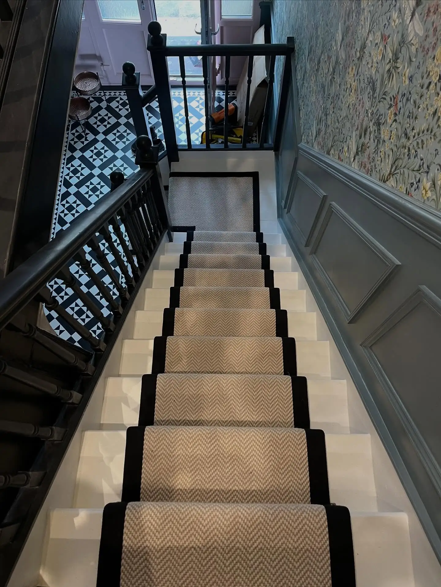 Stair Runner in Beige Tweed with Black Carpet Tape Runner on a White Wood Staircase